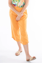 Load image into Gallery viewer, Jump - 3/4 Pleat Detail Pant in Mandarin colour front shot
