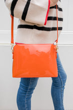 Load image into Gallery viewer, Liv and Milly Ravello Handbag - Orange wore by a model
