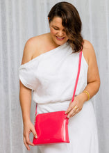 Load image into Gallery viewer, Liv and Milly Ravello Handbag - Pink wore by a model
